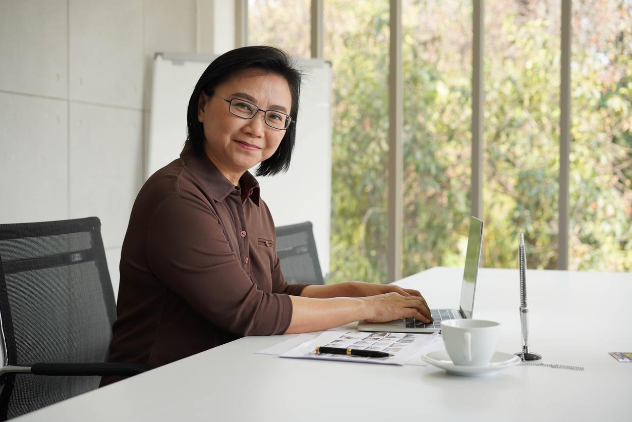 Asian woman researching information